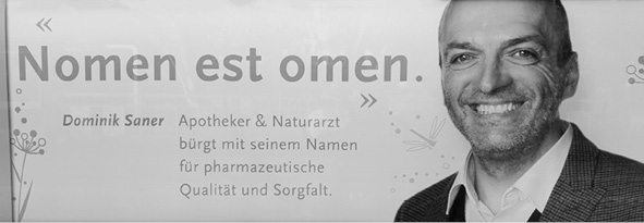 A smiling person with short hair and a beard stands next to text in German promoting pharmaceutical quality and care by Dominik Saner, pharmacist and naturopath.

Description generated by AI